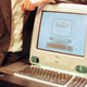 Steve Jobs shows off an iMac in 1998.